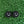 Load image into Gallery viewer, two black circles with white smiley faces on a green surface.