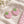 Load image into Gallery viewer, Pink strawberry thumb grips pair - silicone joystick caps for Nintendo Switch 2 with daisy flower detail
